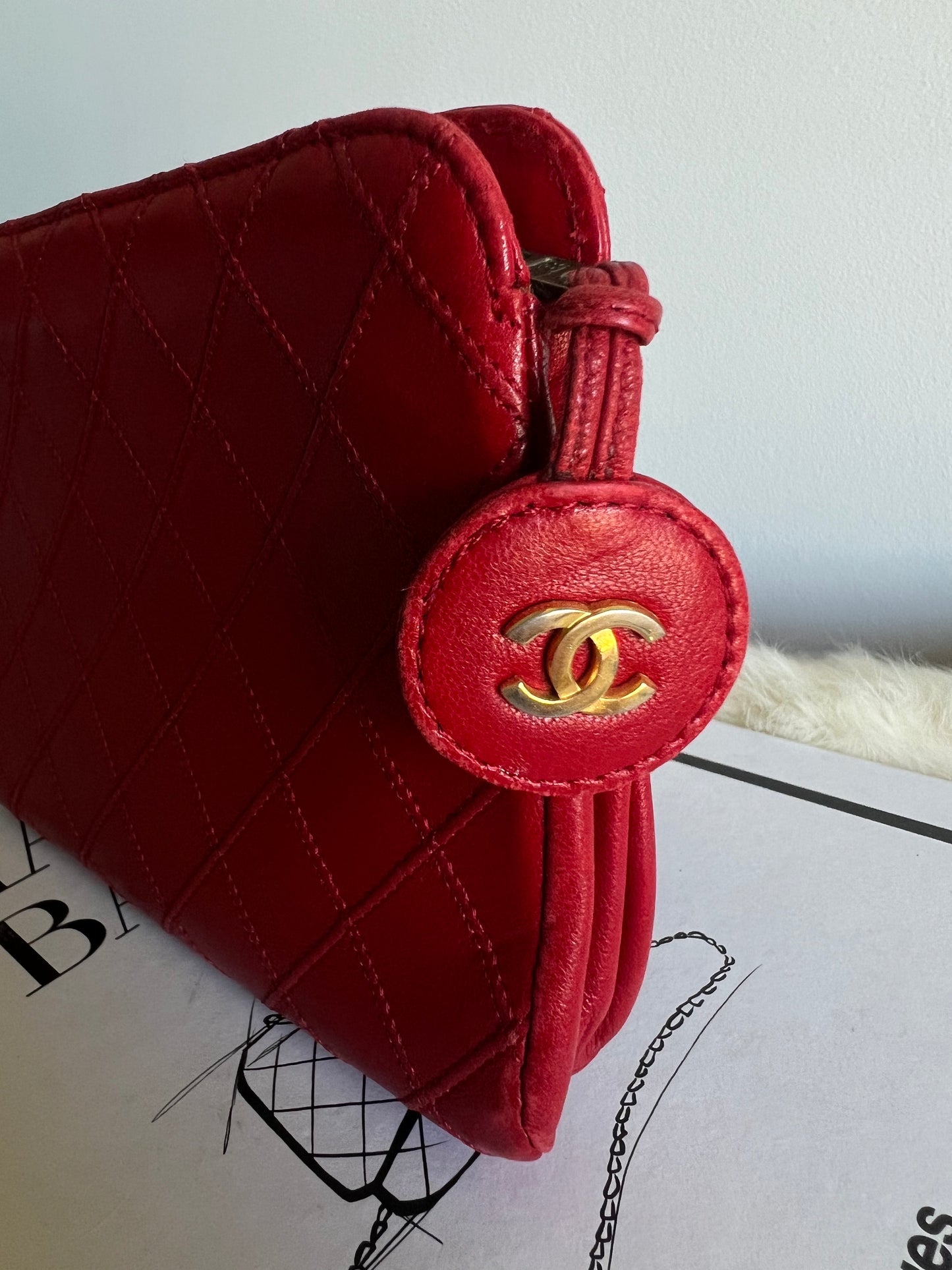 Chanel Diamond Quilted Lambskin Leather Pouch Bag