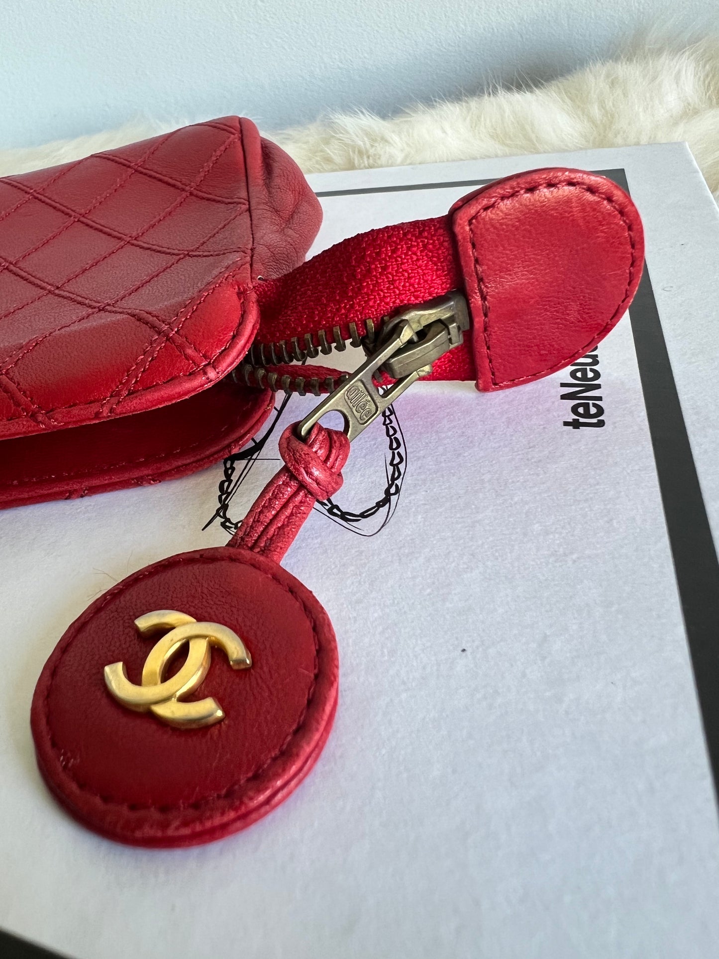 Chanel Diamond Quilted Lambskin Leather Pouch Bag